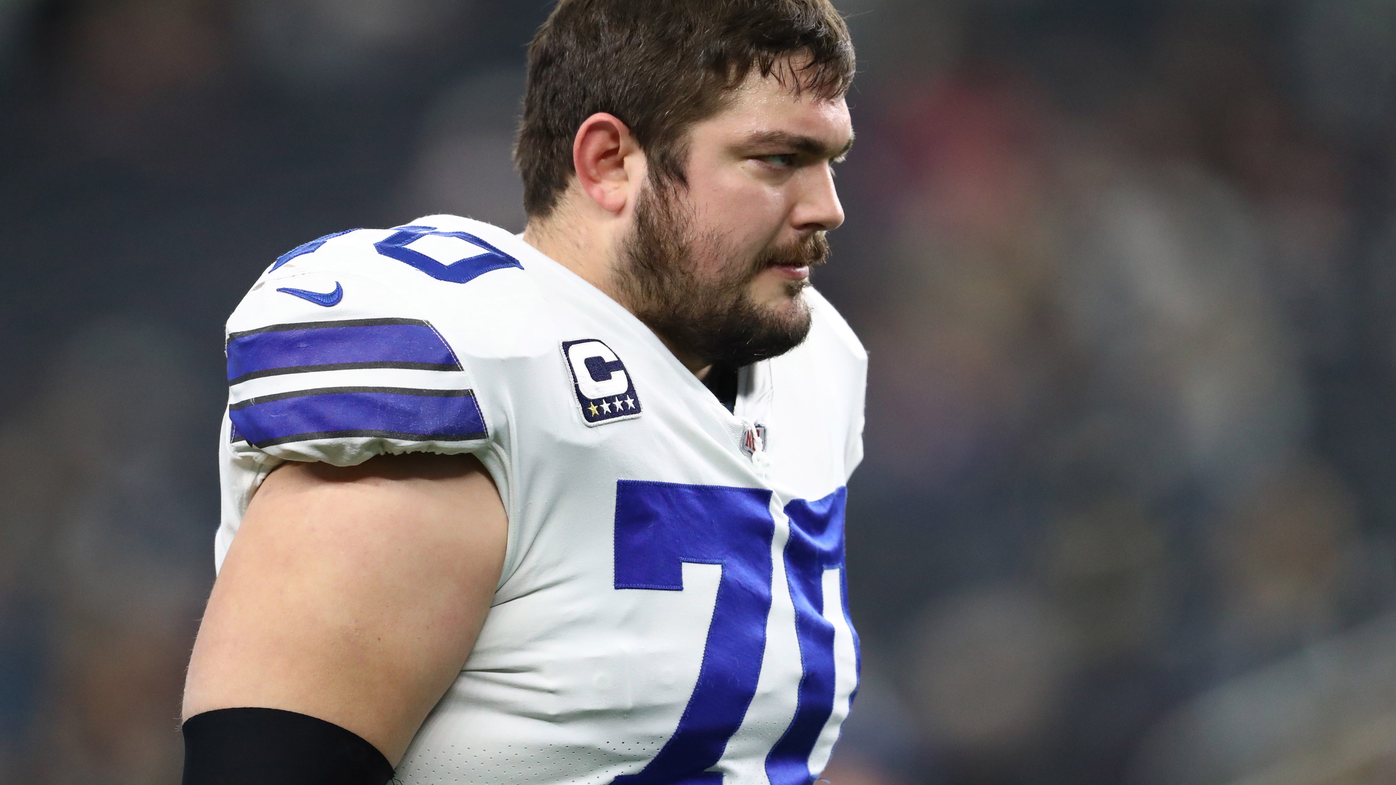 Cowboys free cap space by restructuring multiple veteran contracts