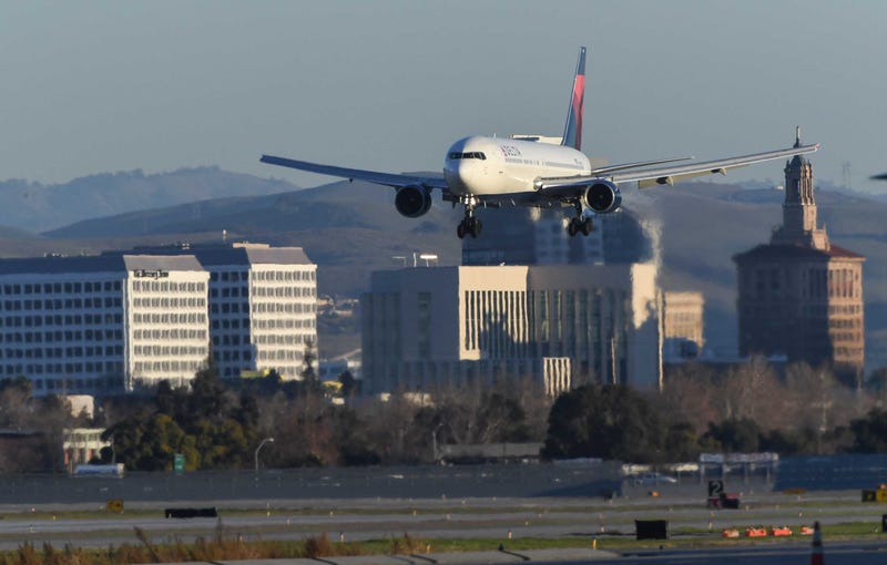 Plane comes in for landing at San Jose International Airport