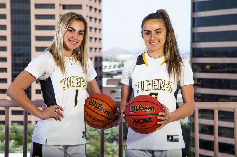 Haley and Hanna Cavinder (left to right) pose for the azcentral sports All-Arizona girls basketball team at the Republic Media Building in Phoenix, 