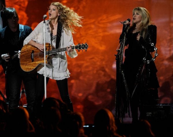 Taylor Swift and Stevie Nicks perform at the 52nd annual Grammy Awards