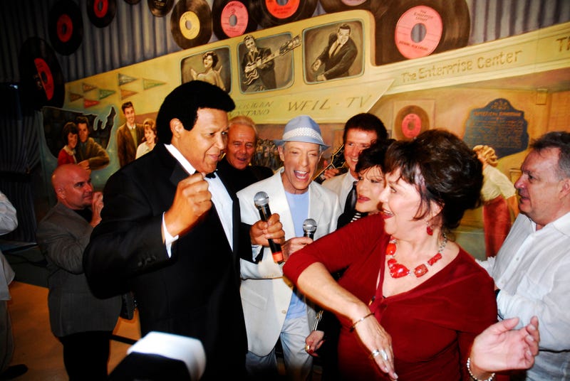 The 50th anniversary celebration of American Bandstand in Philadelphia in 2007. Chubby Checker does the twist with Kathleen "Bunny" Gibson, an early dancer on the show, as Jerry Blavat and Connie Francis (both center) watch. 