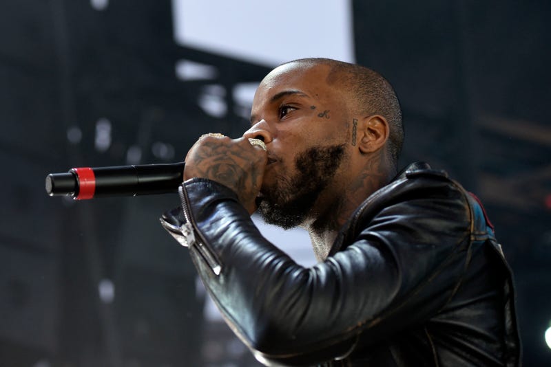 close up of tory lanez onstage with microphone