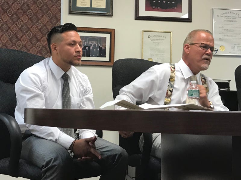Jovanny Crespo, at left, with his attorney Patrick Toscano June 26, 2019