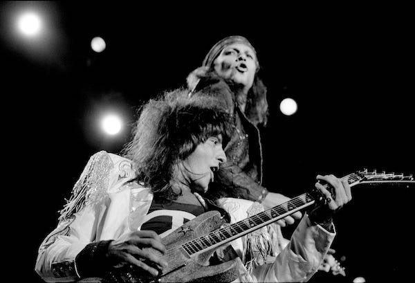 Guitarist Richie Sambora, front, and Jon Bon Jovi start another one of Bon Jovi's hits before a crowd of more than 14,000 at Starwood Amphitheatre July 19, 1989