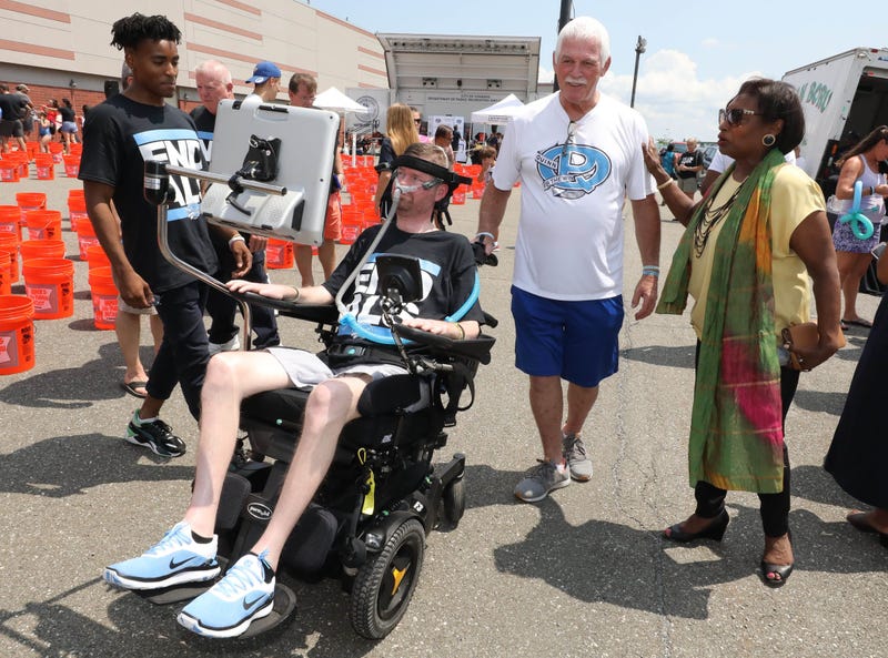 Pat Quinn and his dad, big Pat, are greeted by NYS Senator Andrea Stewart-Cousins, during the 5th annual ALS Ice Bucket Challenge fundraiser at Empire City Casino by MGM Resorts in Yonkers, Aug. 3, 2019.