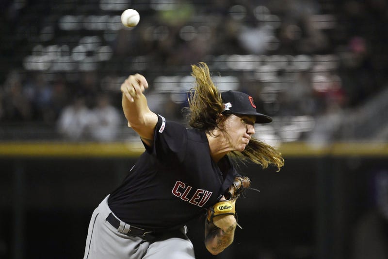 Cleveland Indians starting pitcher Mike Clevinger (52) delivers the ball in the first inning against the Chicago White Sox at Guaranteed Rate Field.