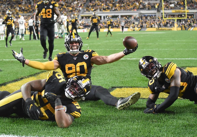 TJ Watt on ground celebrating TD