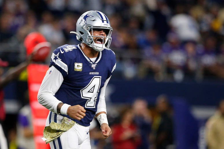 Dak Prescott reacts to touchdown pass