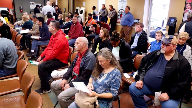 People waiting in line to renew their licenses and get their REAL IDs.