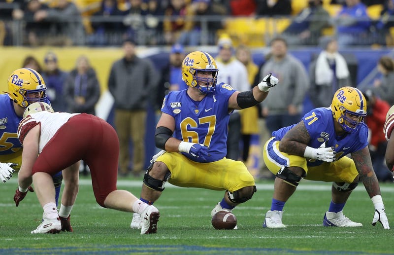 Pittsburgh Panthers center Jimmy Morrissey (67) signals at the line of scrimmage