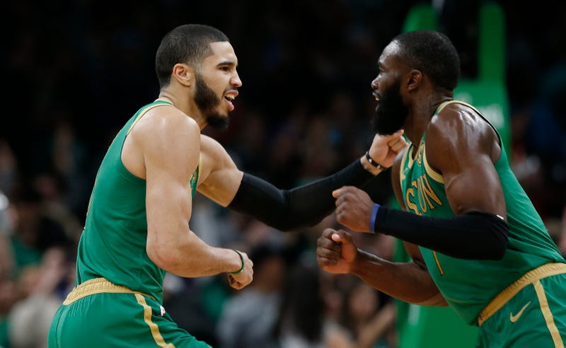 Boston Celtics Jayson Tatum (0) (left) and Jaylen Brown (7) celebrate during the second half against the Denver Nuggets at TD Garden in 2019.