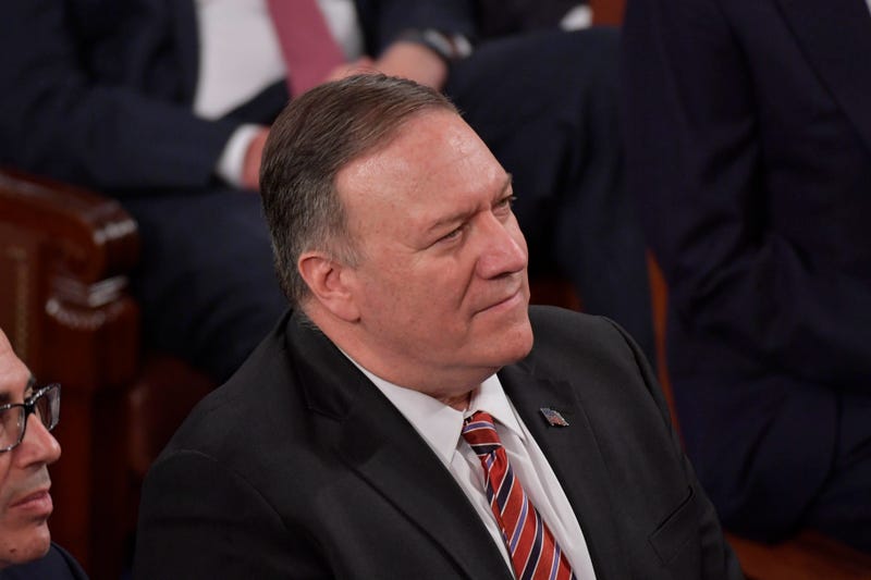 Secretary of State Mike Pompeo listens as President Donald J. Trump delivers the State of the Union address from the House chamber of the United States Capitol in Washington.