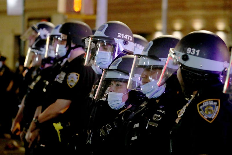 Members of the NYPD stand in line to block protestors from Union Square in Manhattan May 30, 2020