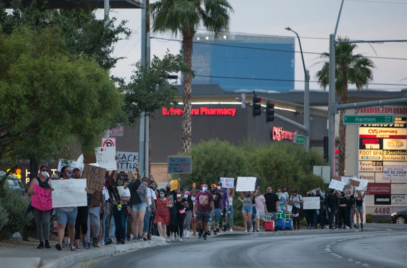 Las Vegas residents take to the streets to march in solidarity with Black Lives Matter Tuesday, June 2, 2020.