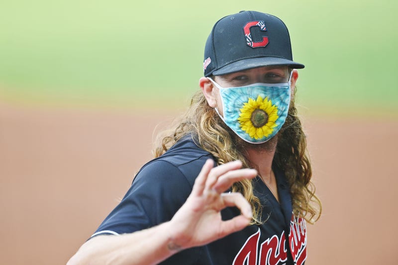  Cleveland Indians starting pitcher Mike Clevinger (52) flashes the OK sign at teammates before the game between the Cleveland Indians and the Pittsburgh Pirates at Progressive Field. 