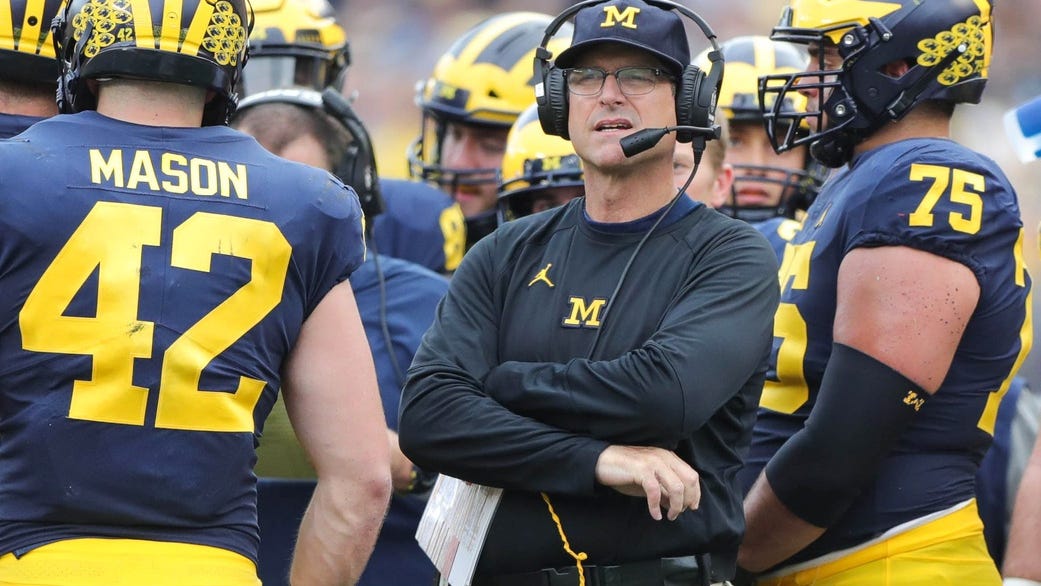 Michigan will reportedly keep Jim Harbaugh if he accepts pay cut