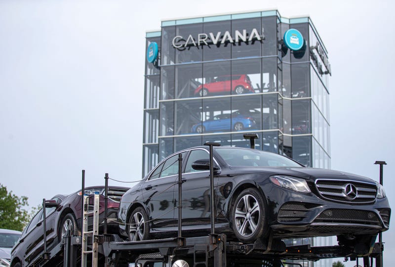 While their slogan promises to 'drive you happy," officials with the State of Michigan accuse the Carvana vending machine of falling short on happiness and delivering big on violations.