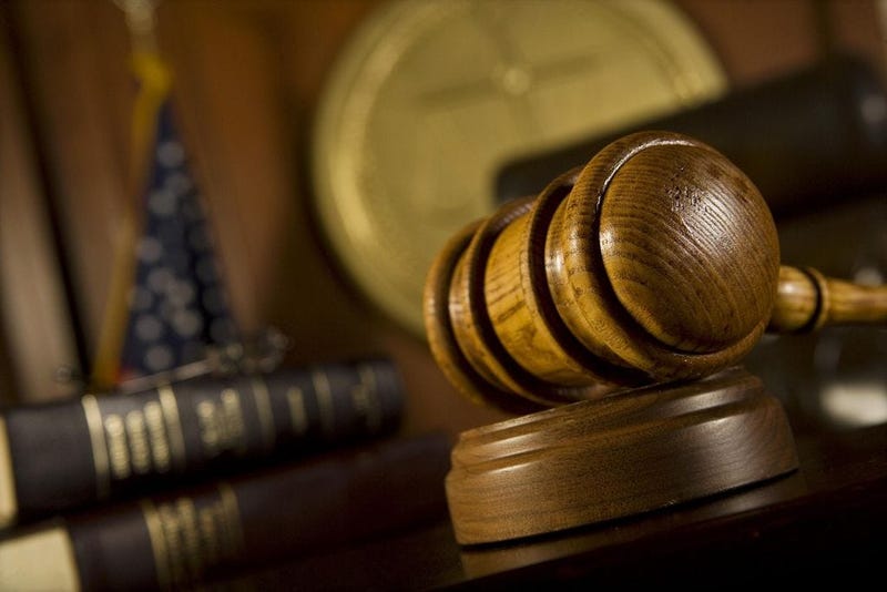 Suit asks Circuit Judge to decide who holds the Chair gavel as dispute rages.