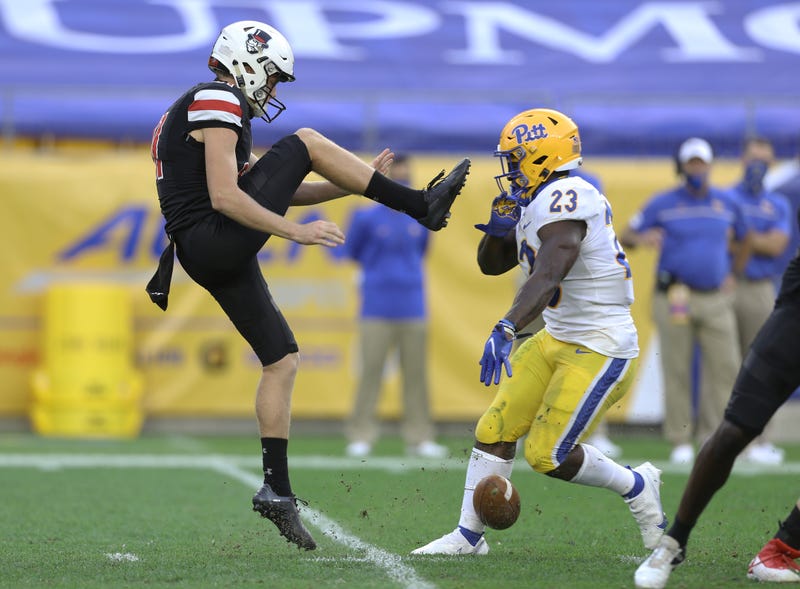 Pittsburgh Panthers running back Todd Sibley Jr. (23) blocks the punt of Austin Peay Governors punter Cole Deeds (81) and returns it for a touchdown during the third quarter at Heinz Field.