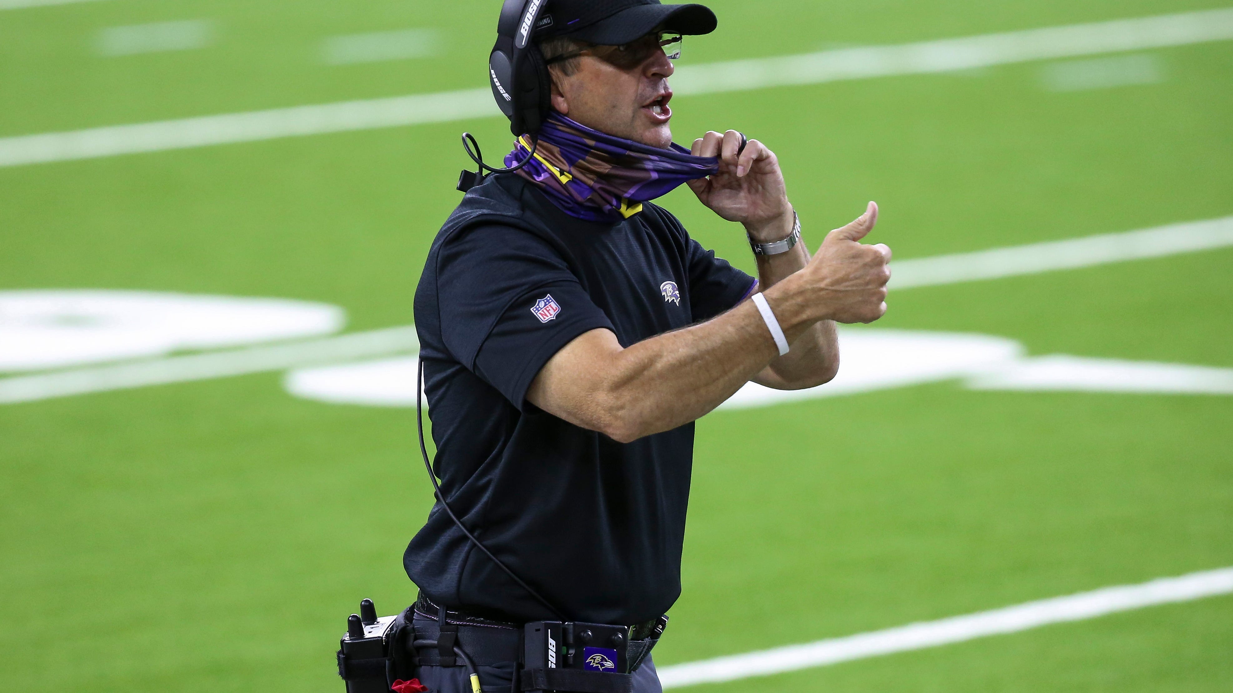 Ravens coach digs in after unmasked tirade inches from official