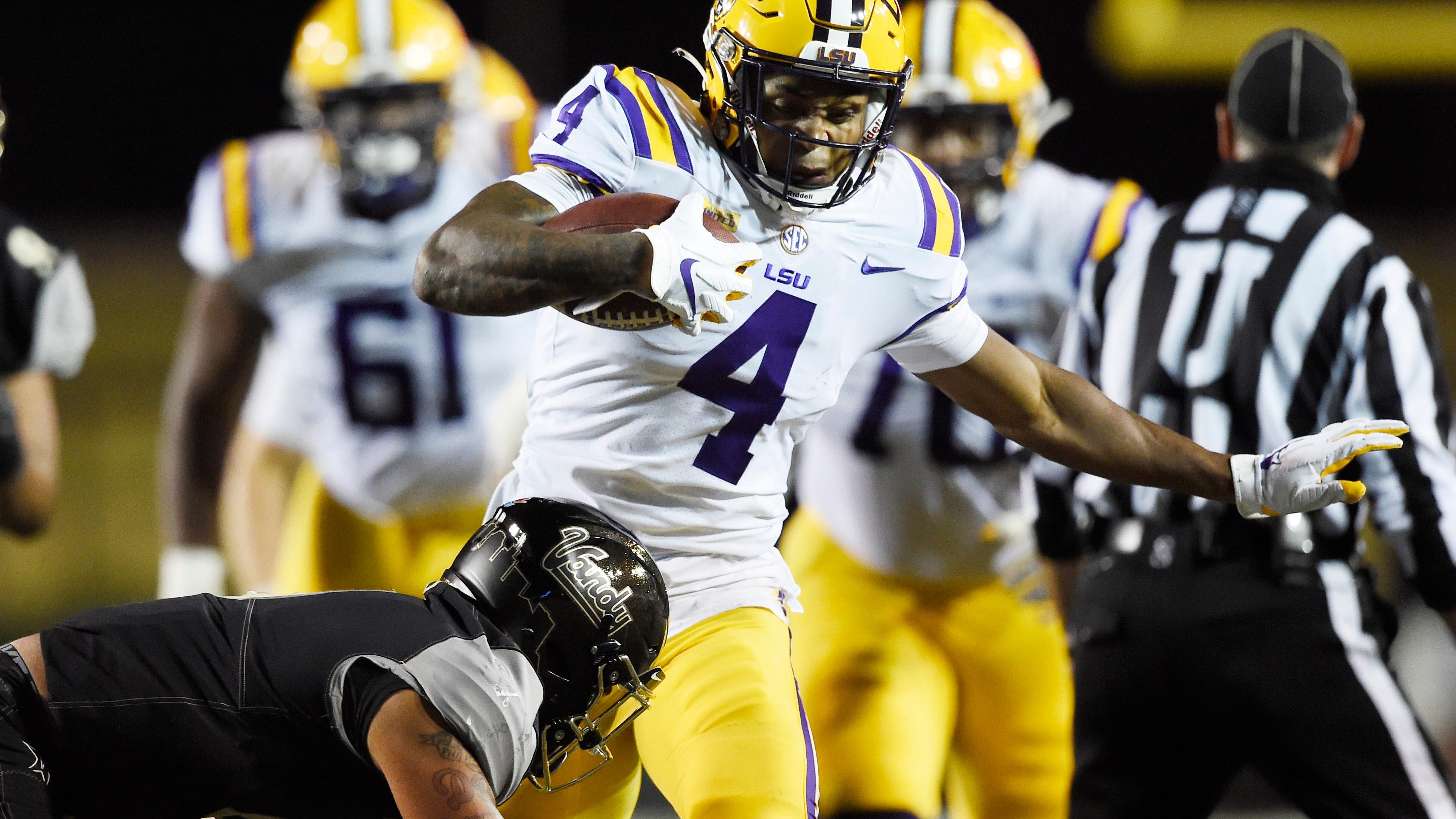 Trio of LSU players, including RB John Emery, miss UCLA game due to academic issue