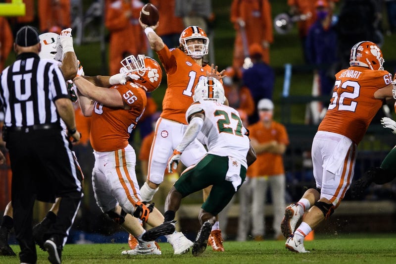 Clemson Tigers quarterback Trevor Lawrence (16) throws the ball against the Miami Hurricanes during the second quarter at Memorial Stadium. 