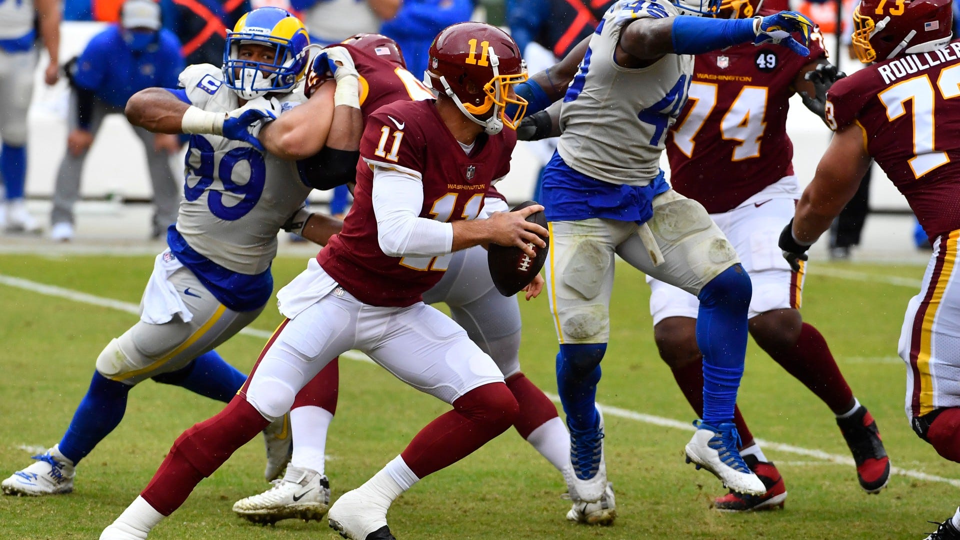 WATCH: Alex Smith sacked six times by Rams in NFL return