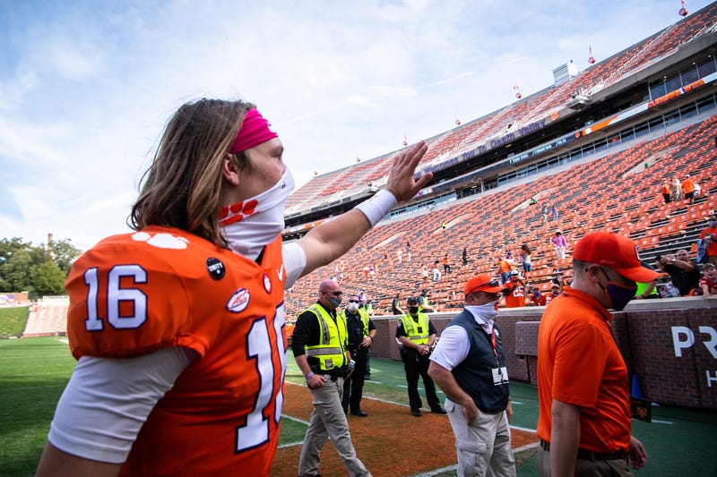 Clemson quarterback Trevor Lawrence (16) waves to fans after their game against Syracuse at Memorial Stadium.