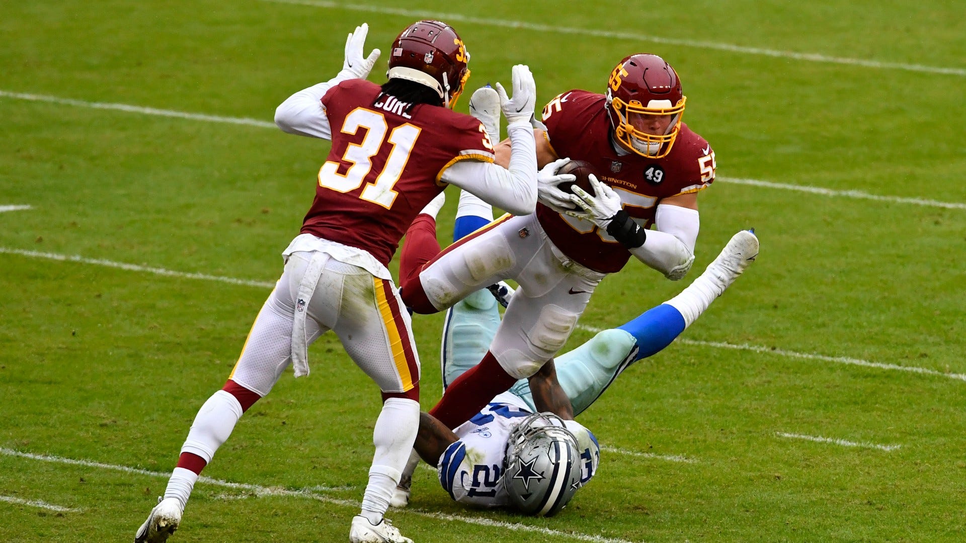 WATCH: Cole Holcomb runs over Ezekiel Elliott