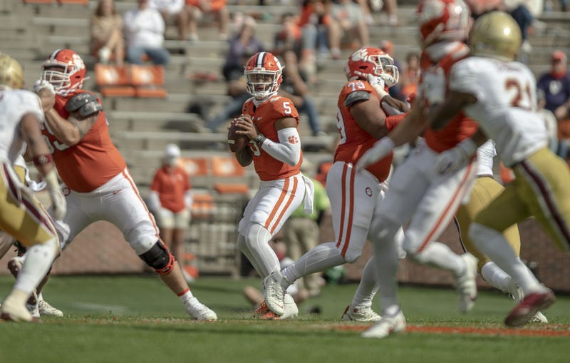 Clemson quarterback D.J. Uiagalelei (5) drops back to pass during the first quarter of the game against Boston College at Memorial Stadium.