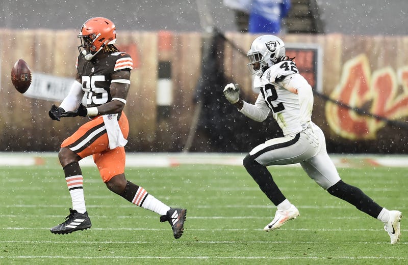 Cleveland Browns tight end David Njoku (85) drops a pass as Las Vegas Raiders inside linebacker Cory Littleton (42) defends during the second half at FirstEnergy Stadium.