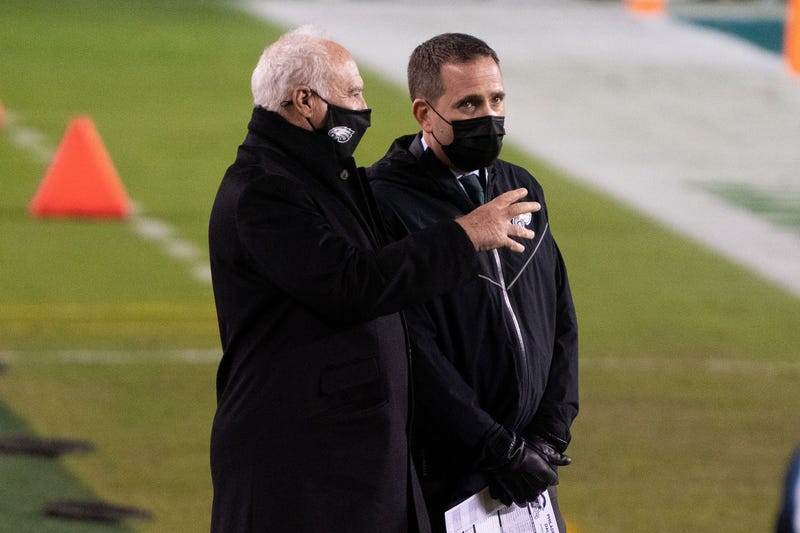 From left: Philadelphia Eagles owner Jeffrey Lurie talks with general manager Howie Roseman before a game against the Dallas Cowboys at Lincoln Financial Field.
