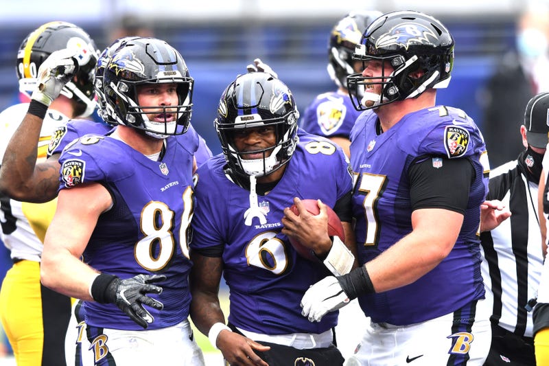 Bradley Bozeman congratulates Lamar Jackson