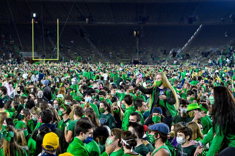 Fans on field at Notre Dame