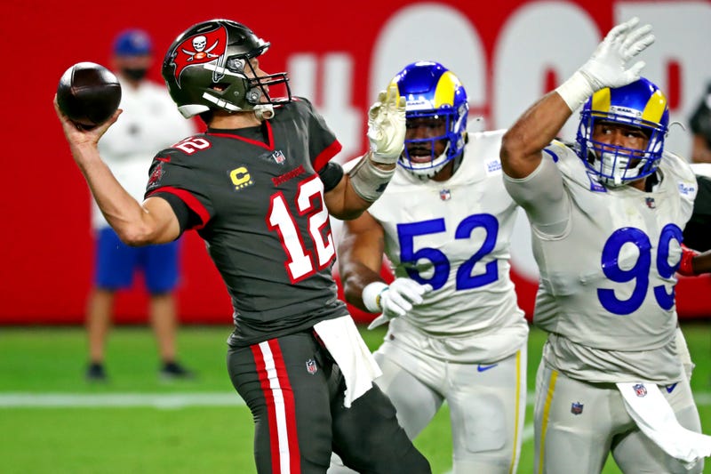Buccaneers QB Tom Brady and Rams DT Aaron Donald.