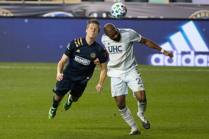 Philadelphia Union defender Jack Elliott (3) heads the ball against New England Revolution defender Andrew Farrell (2) during the second half at Subaru Park.