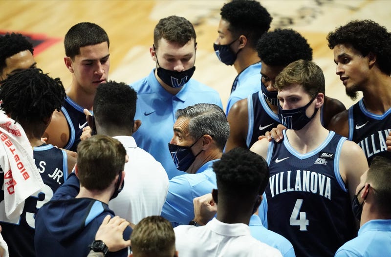 Villanova Wildcats head coach Jay Wright (center) talks to his players during a time out in the first half against the Hartford Hawks