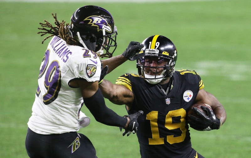 JuJu Smith-Schuster pushing Raven