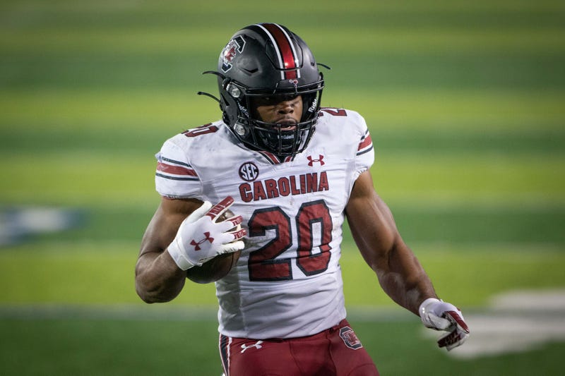 South Carolina Gamecocks running back Kevin Harris (20) scores a touchdown during the third quarter against the Kentucky Wildcats at Kroger Field.