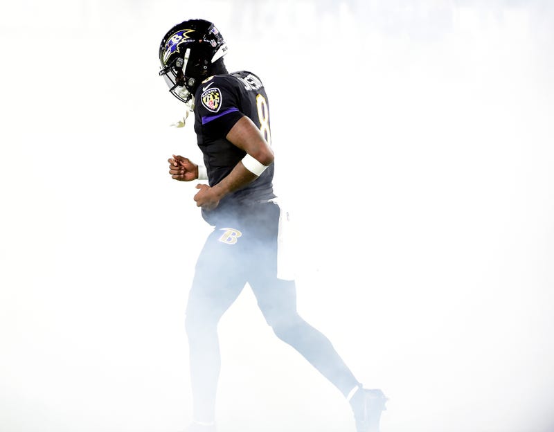 Lamar Jackson walks out of the tunnel in his first game back since his Covid-19 diagnosis.