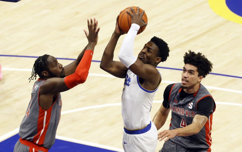 Xavier Johnson drives the hoop