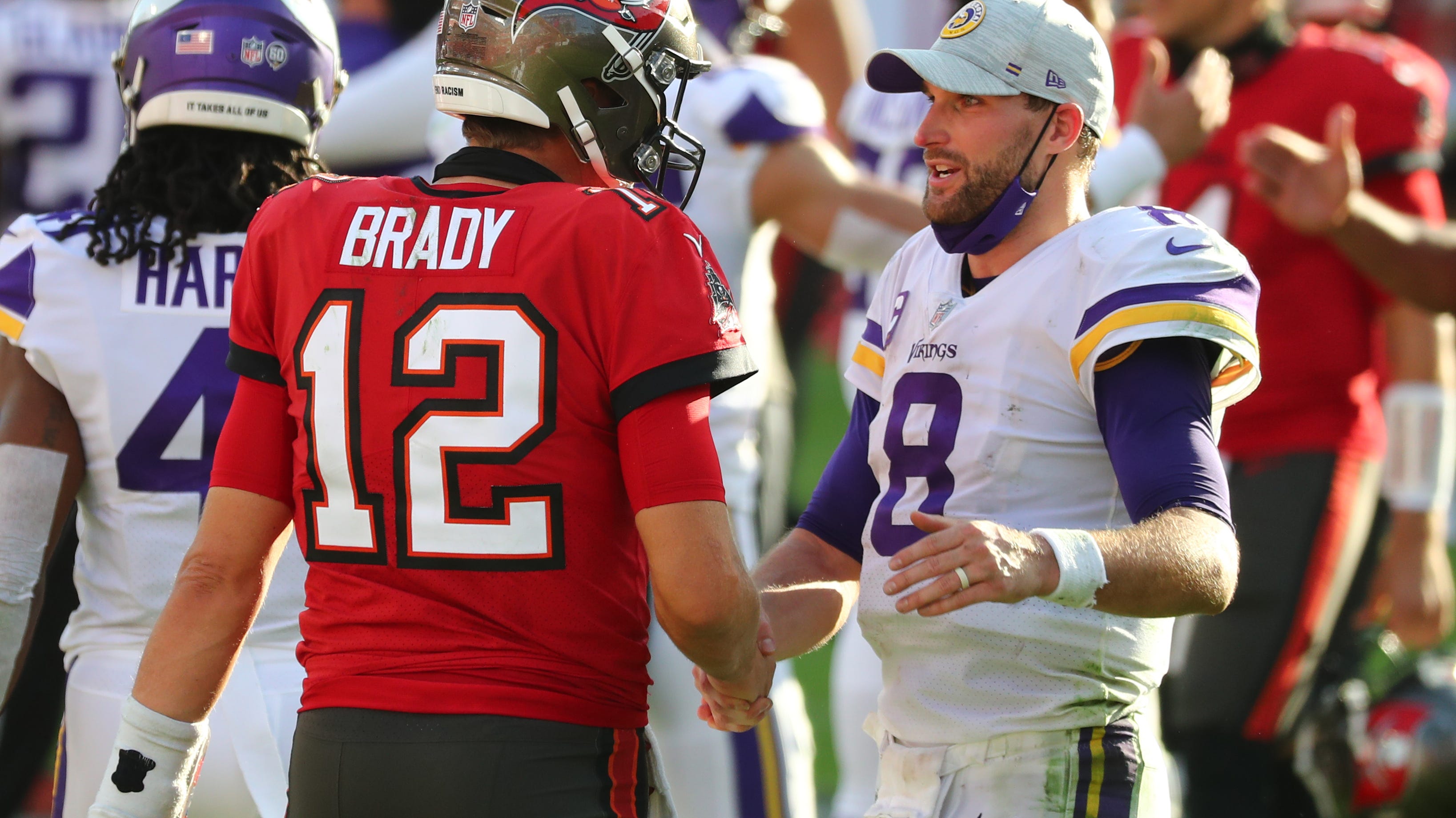 Which NFL quarterbacks have been vaccinated against COVID-19?