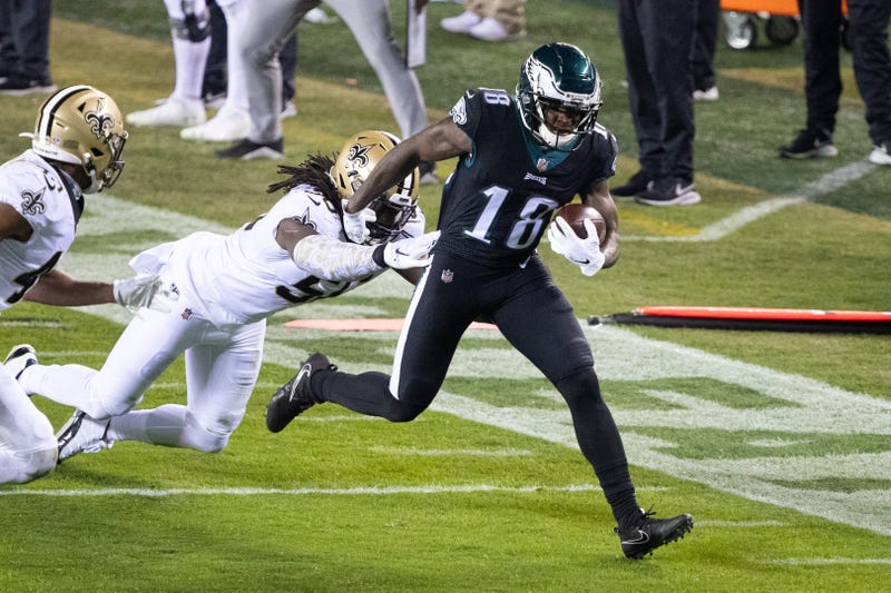 Jalen Reagor evades a tackle against the Saints.