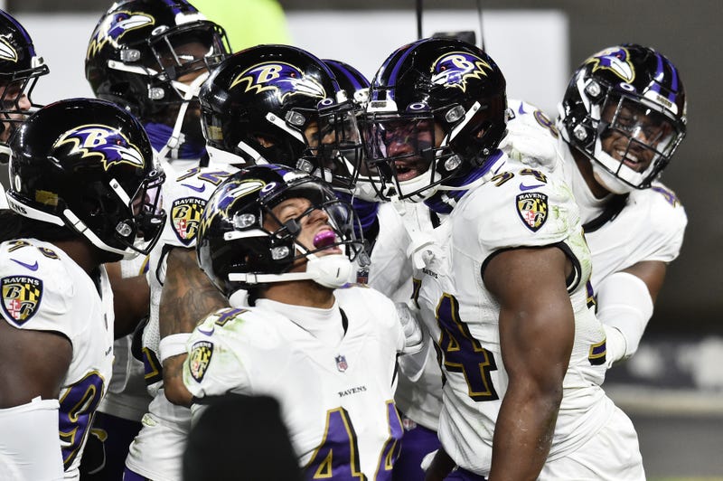 The Ravens defense celebrates an interception during Baltimore's Monday Night Football win over Cleveland.
