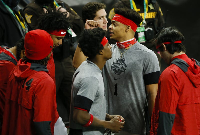 Ohio State Buckeyes quarterback Justin Fields (1) prepares for warmups before the start of the Big Ten Championship football game between the Ohio State Buckeyes and the Northwestern Wildcats on Saturday, Dec. 19, 2020 at Lucas Oil Stadium in Indianapolis.