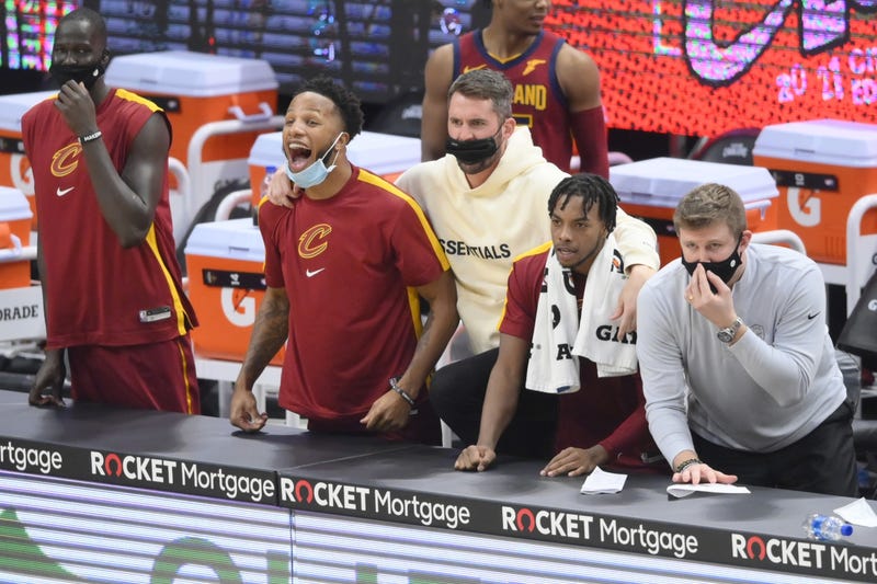 Cleveland Cavaliers forward Kevin Love (0), center, and the Cavaliers celebrate in the fourth quarter against the Charlotte Hornets at Rocket Mortgage FieldHouse.