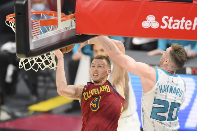 Cleveland Cavaliers guard Dylan Windler (9) moves to the basket against Charlotte Hornets forward Gordon Hayward (20) in the third quarter at Rocket Mortgage FieldHouse.