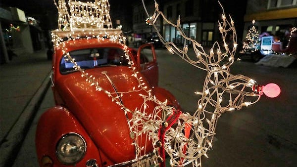 Real deer won't stop attacking a Rudolph lawn decoration because they feel threatened