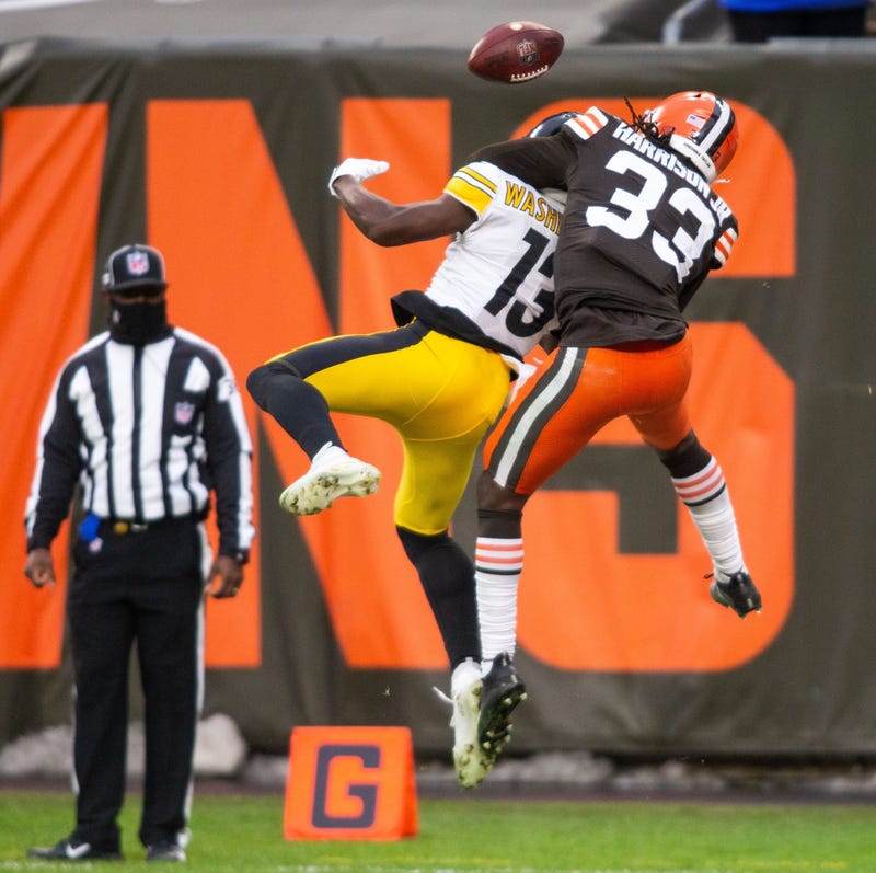Cleveland Browns strong safety Ronnie Harrison (33) breaks up a pass intended for Pittsburgh Steelers wide receiver James Washington (13) during the fourth quarter at FirstEnergy Stadium.