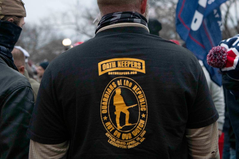 Men sporting gear identifying them as "Oath Keepers"